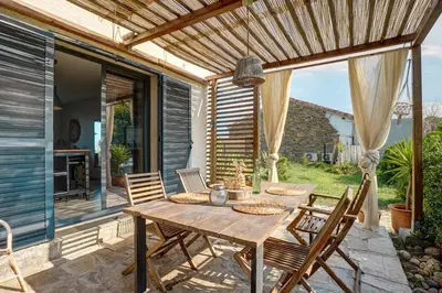 Jardin de l'établissement A Stalla - Maison pieds dans l'eau à Lucciana