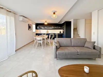 Coin salon dans l'établissement Duplex T4 proche de la plage à Calvi