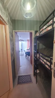 Un ou plusieurs lits dans un hébergement de l'établissement Appartement 5 couchages à Calvi