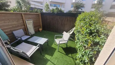Jardin de l'établissement Appartement 5 couchages à Calvi