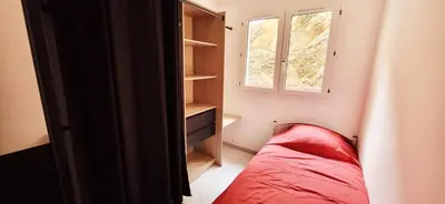 Un ou plusieurs lits dans un hébergement de l'établissement Appartement vue mer, pietranera