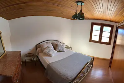Un ou plusieurs lits dans un hébergement de l'établissement Villa avec vue panoramique sur les montagnes