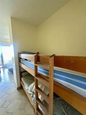 Un ou plusieurs lits dans un hébergement de l'établissement Appartement vue mer à Ile Rousse