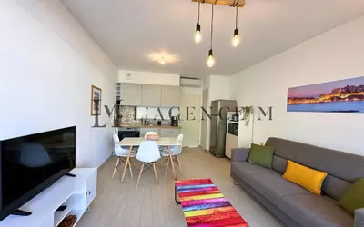 Télévision ou salle de divertissement dans l'établissement Studio Bis Rivages 100m de la plage, lumineux