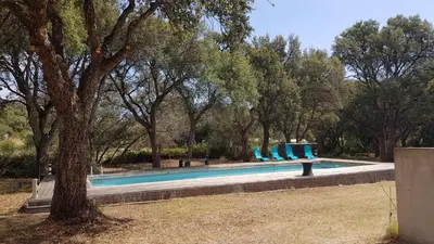 Piscine de l'établissement Gite de 90m2 proche de la mer avec grande piscine MONTI ou située à proximité