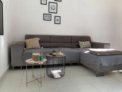 Coin salon dans l'établissement Appartement en centre ville