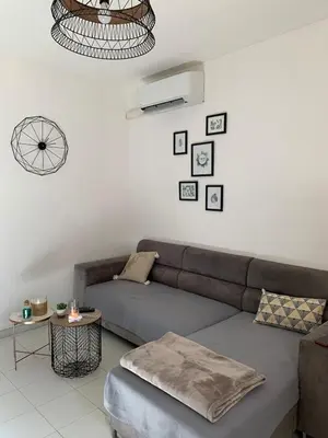 Coin salon dans l'établissement Appartement en centre ville