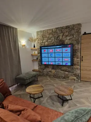 Télévision ou salle de divertissement dans l'établissement CasaKia