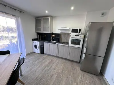 Cuisine ou kitchenette dans l'établissement U TERZU - Appart neuf spacieux