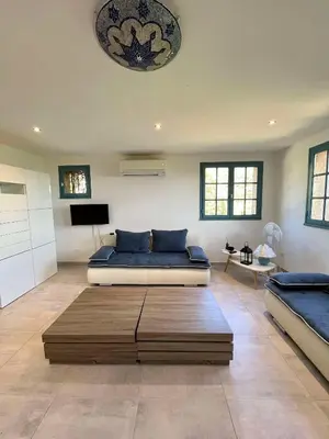 Coin salon dans l'établissement Bel appartement proche du centre ville