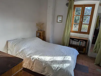 Un ou plusieurs lits dans un hébergement de l'établissement Maison de charme