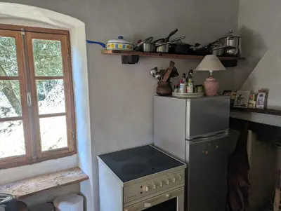Cuisine ou kitchenette dans l'établissement Maison de charme