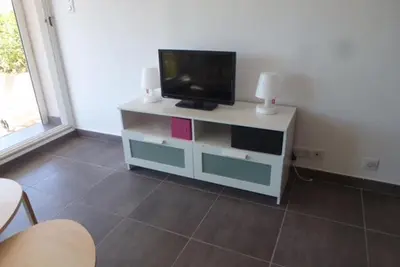 Télévision ou salle de divertissement dans l'établissement Les Marines du Soleil à Saint-Florent