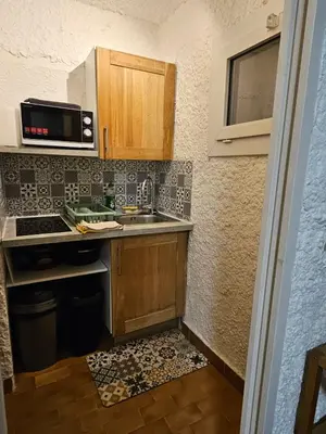 Cuisine ou kitchenette dans l'établissement Cocody