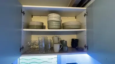 Cuisine ou kitchenette dans l'établissement Chalet climatisé en Haute-Corse 500m plage - camping Marina di Sorbo