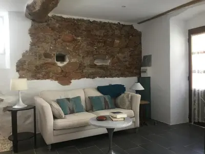 Coin salon dans l'établissement Maison à Porticciolo, idéale pour un couple