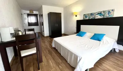 Un ou plusieurs lits dans un hébergement de l'établissement Studio 3 pers climatisé avec piscine à ST FLORENT