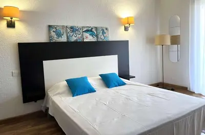 Un ou plusieurs lits dans un hébergement de l'établissement Studio 3 pers climatisé avec piscine à ST FLORENT