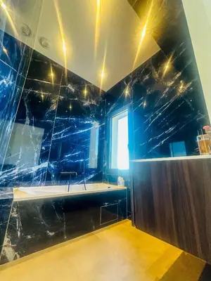 Salle de bains dans l'établissement Superbe villa vue mer et piscine