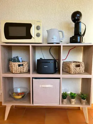 Cuisine ou kitchenette dans l'établissement T3 climatisé pour 4 à 6 personnes proche mer en Corse