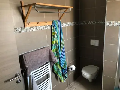 Salle de bains dans l'établissement Bord De Mer, Commerces Rivière 15mn