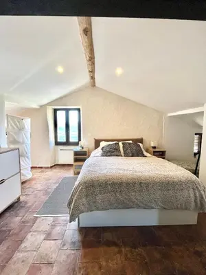 Un ou plusieurs lits dans un hébergement de l'établissement Superbe maison de charme vue mer