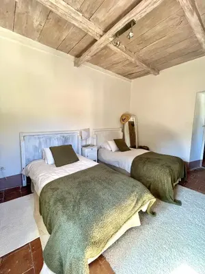 Un ou plusieurs lits dans un hébergement de l'établissement Superbe maison de charme vue mer