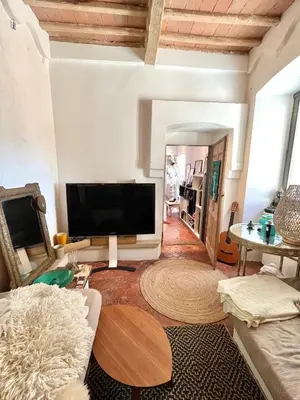 Télévision ou salle de divertissement dans l'établissement Superbe maison de charme vue mer