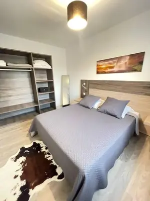 Un ou plusieurs lits dans un hébergement de l'établissement Appartement Lido de la Marana