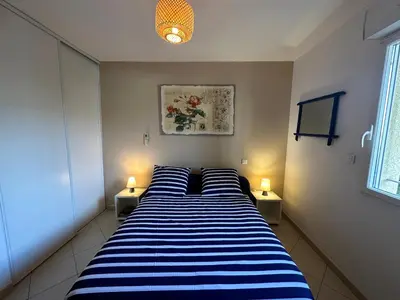 Un ou plusieurs lits dans un hébergement de l'établissement Appartement T2 Eucalyptus L'ILE-ROUSSE