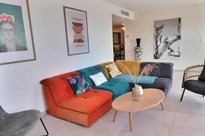 Coin salon dans l'établissement Appartement ISULA ROSSA