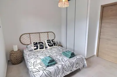Un ou plusieurs lits dans un hébergement de l'établissement Appartement ISULA ROSSA