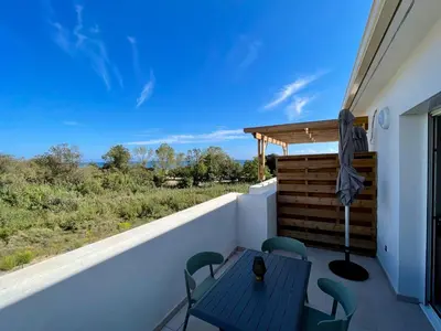 Balcon ou terrasse dans l'établissement Appt Lumineux pieds dans l'eau N181