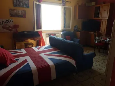 Coin salon dans l'établissement Appartements Luccisano