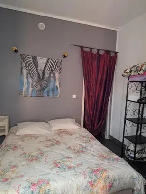 Un ou plusieurs lits dans un hébergement de l'établissement Appartements Luccisano