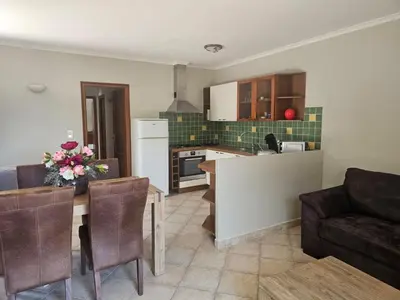 Cuisine ou kitchenette dans l'établissement Rez de villa
