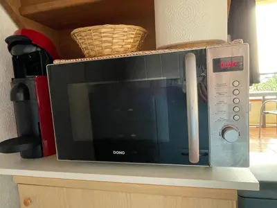 Cuisine ou kitchenette dans l'établissement Appartement T2 vue mer, piscine Linguizzetta Bravone