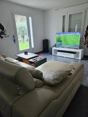 Télévision ou salle de divertissement dans l'établissement Maison de village