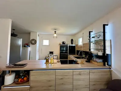 Cuisine ou kitchenette dans l'établissement Appartement Cardellina Jardin & Ville