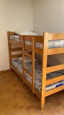 Un ou plusieurs lits dans un hébergement de l'établissement Gite d'étape Auberge Luna Piena