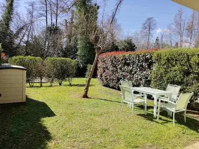 Jardin de l'établissement Appartement avec jardin piscine et plage 100 m