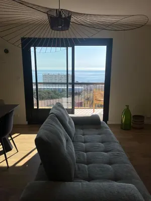 Coin salon dans l'établissement Appartement Mare Vista
