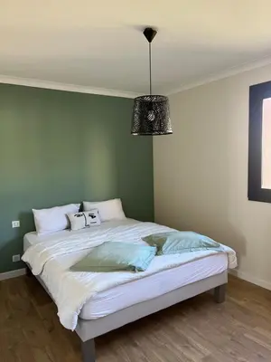 Un ou plusieurs lits dans un hébergement de l'établissement Appartement Mare Vista