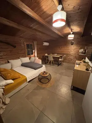 Un ou plusieurs lits dans un hébergement de l'établissement Chalet studio