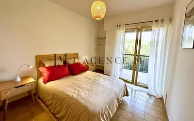 Un ou plusieurs lits dans un hébergement de l'établissement Appartement Lugaro Paisible & charmant