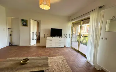 Télévision ou salle de divertissement dans l'établissement Appartement Lugaro Paisible & charmant