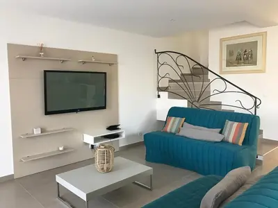 Télévision ou salle de divertissement dans l'établissement PDM Appartement Paese di Mare