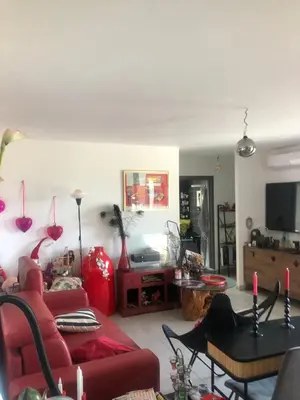 Télévision ou salle de divertissement dans l'établissement T3 Baie de Calvi jardin panoramique vue mer