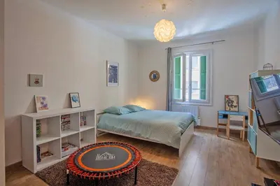 Un ou plusieurs lits dans un hébergement de l'établissement Grand-appartement-centre-Bastia