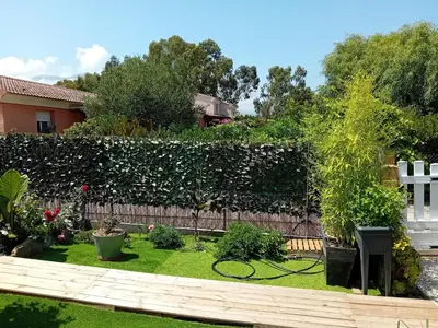 Jardin de l'établissement Villa de luxe en bord de mer Résidence Torra Mare a Prunete